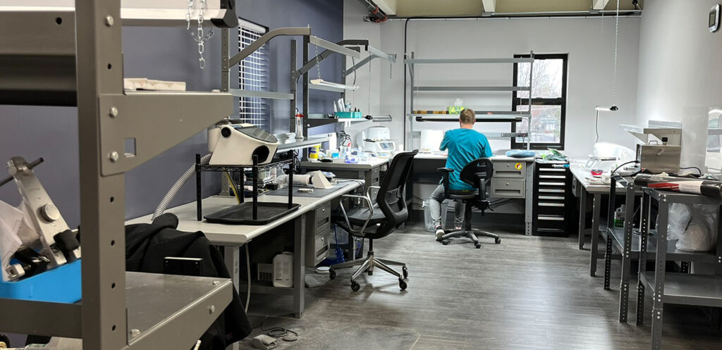 dental technician working in a lab, crown and bridge department